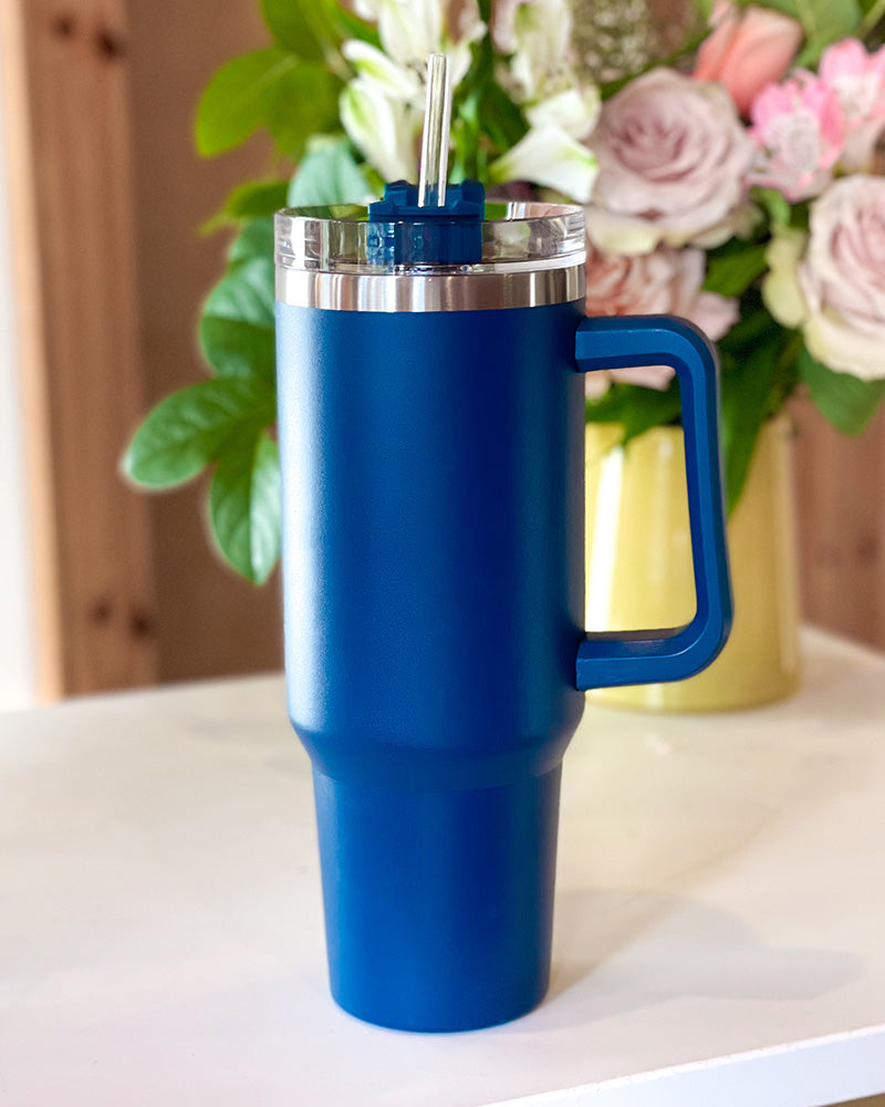 https://trueorangeboutique.com/cdn/shop/products/Hydrating-40oz-Tumbler-Dark-Blue-1.jpg?v=1677012212